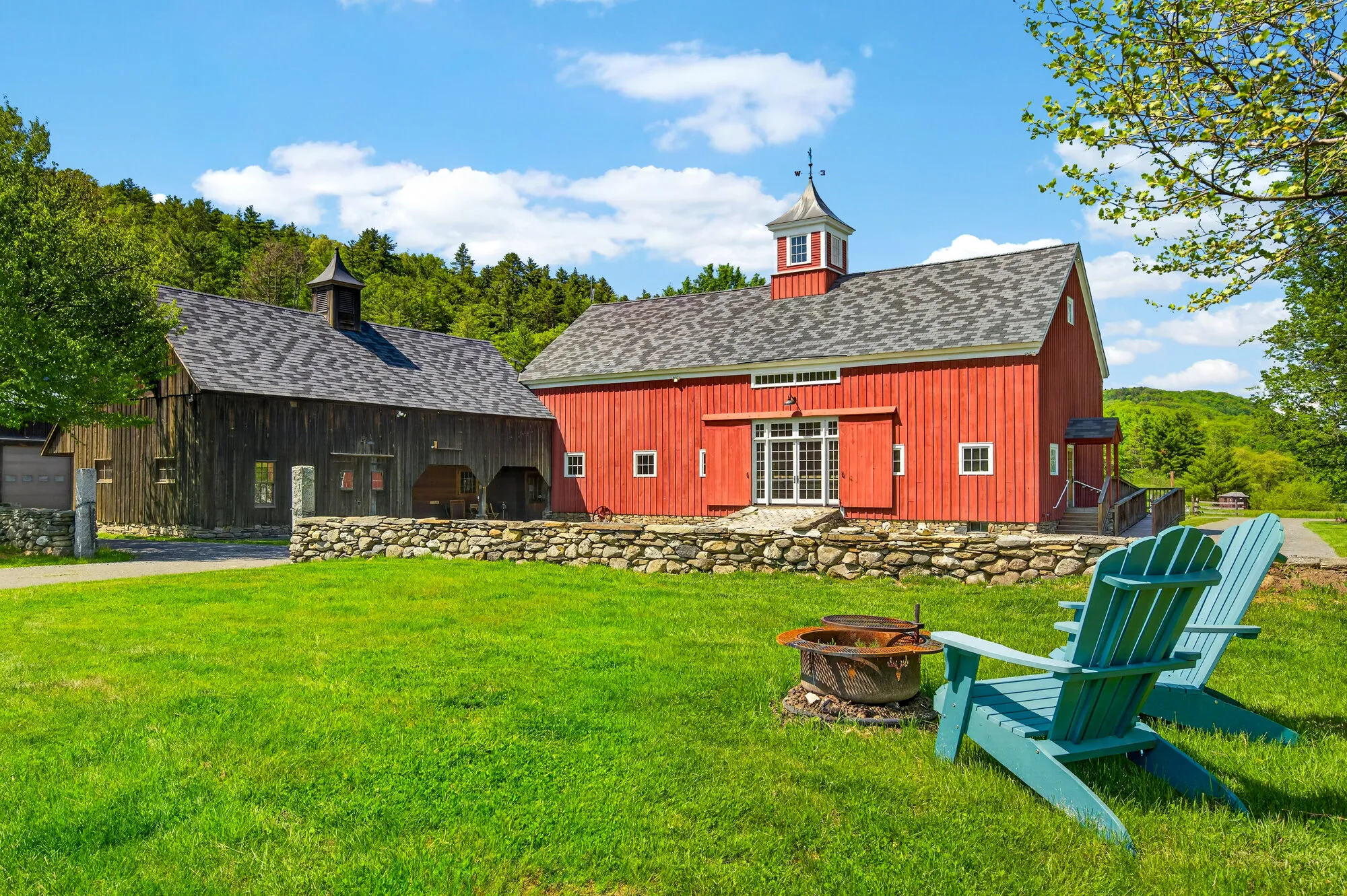 Red barn and lawn chairs at a Vermont country property